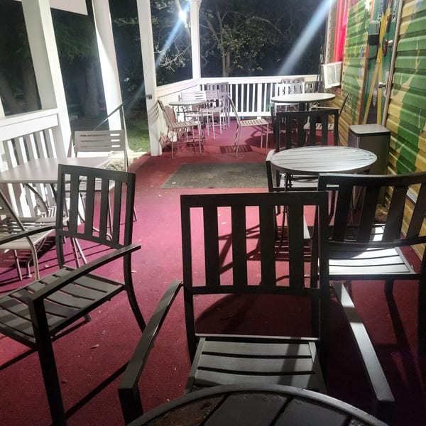 Outdoor patio dining at The Jerk Pit
