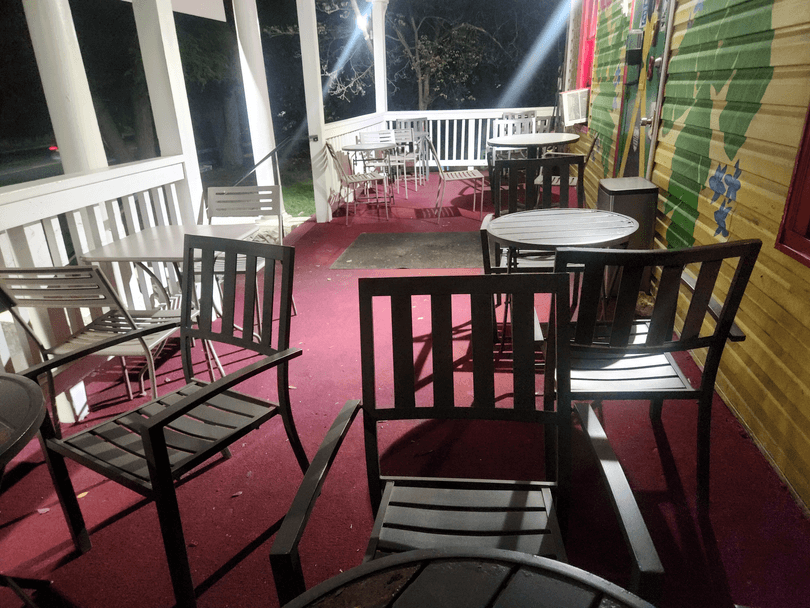 Outdoor patio dining at The Jerk Pit